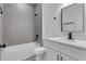 Bathroom with single vanity and shower/tub combo at 526 Marion Oaks Trl, Ocala, FL 34473