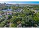 Aerial view showing home's location, near a lake and city skyline at 732 Edgewater Dr, Orlando, FL 32804