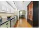 Spacious kitchen with ample counter space, breakfast bar, and stylish light fixtures at 732 Edgewater Dr, Orlando, FL 32804