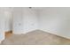 Bedroom with double door closet and access to bathroom at 9021 Carlotta Way, Kissimmee, FL 34747