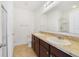 Bathroom with double vanity and granite countertop at 9021 Carlotta Way, Kissimmee, FL 34747