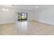 Bright dining room with tile floors and sliding glass doors leading to the patio at 9021 Carlotta Way, Kissimmee, FL 34747