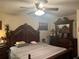 Main bedroom with king-size bed and ceiling fan at 575 Bloomington Ct # 27, Altamonte Springs, FL 32714