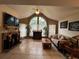 Spacious living room featuring a fireplace and ample natural light at 575 Bloomington Ct # 27, Altamonte Springs, FL 32714
