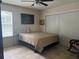 Bright bedroom with a queen bed, ceiling fan, and window with blinds at 575 Bloomington Ct # 27, Altamonte Springs, FL 32714