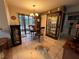 Bright dining area with a wooden table and chairs, near sliding doors at 575 Bloomington Ct # 27, Altamonte Springs, FL 32714