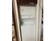 White stacked washer and dryer in a closet at 575 Bloomington Ct # 27, Altamonte Springs, FL 32714