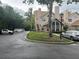 Townhome exterior with landscaping and parking at 575 Bloomington Ct # 27, Altamonte Springs, FL 32714