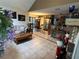 Open living area with tiled floors and views into the kitchen at 575 Bloomington Ct # 27, Altamonte Springs, FL 32714