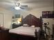 Main bedroom with king-size bed and ceiling fan at 575 Bloomington Ct # 27, Altamonte Springs, FL 32714