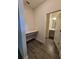 Built-in desk area with a view into the bathroom at 1075 Trappers Trail Loop, Davenport, FL 33896