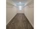 Large walk-in closet with wire shelving and carpeted flooring at 1075 Trappers Trail Loop, Davenport, FL 33896