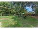 Spacious backyard with firepit and pergola at 2350 Pleasant Dr, Longwood, FL 32779