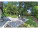 Large backyard with patio, firepit, and shade trees at 2350 Pleasant Dr, Longwood, FL 32779
