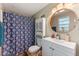 Clean bathroom with a shower/tub combo and updated vanity at 2350 Pleasant Dr, Longwood, FL 32779