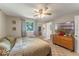 Spacious bedroom with a large TV and dresser at 2350 Pleasant Dr, Longwood, FL 32779