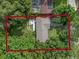 Overhead view of a single-story home with a large backyard surrounded by trees at 2350 Pleasant Dr, Longwood, FL 32779