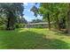 Large backyard with spacious lawn and covered patio at 2350 Pleasant Dr, Longwood, FL 32779