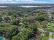 Aerial close-up view of a house located in a quiet, tree-filled neighborhood at 2350 Pleasant Dr, Longwood, FL 32779