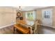 Casual dining area with a colorful table and chairs, adding character to the space at 2350 Pleasant Dr, Longwood, FL 32779