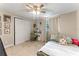 Bedroom with double doors, a desk, and a daybed at 2350 Pleasant Dr, Longwood, FL 32779
