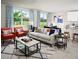 Living room with comfortable seating and a large window at 3514 Rutland Ln, Haines City, FL 33844