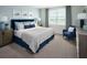 Spacious Primary bedroom with lake view and sitting area at 3514 Rutland Ln, Haines City, FL 33844