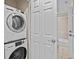 Stackable washer and dryer in laundry closet at 7651 Whisper Way # 401, Reunion, FL 34747