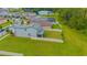 Aerial view of two-story home with fenced backyard at 2048 Napoli Dr, Saint Cloud, FL 34771