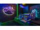 Star Wars themed home theater with reclining seats and vibrant LED lighting at 8911 Coconut Breeze Dr, Kissimmee, FL 34747