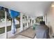 Relaxing screened porch with patio furniture and grill at 3216 Lynrock Ave, Dundee, FL 33838