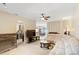 Spacious living room featuring a large sectional sofa and a view into the dining area at 3216 Lynrock Ave, Dundee, FL 33838