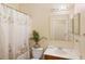 Bathroom includes a shower/tub combo and updated vanity at 3216 Lynrock Ave, Dundee, FL 33838