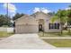 Two-story house with a two car garage at 3216 Lynrock Ave, Dundee, FL 33838