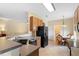 Kitchen boasts a breakfast nook and modern appliances at 3216 Lynrock Ave, Dundee, FL 33838