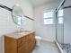 Updated bathroom with subway tile and granite vanity at 700 Eldridge St, Orlando, FL 32803