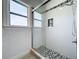 Clean bathroom with subway tile shower and pebble floor at 700 Eldridge St, Orlando, FL 32803