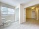 Bathroom featuring toilet and grey tile floors at 700 Eldridge St, Orlando, FL 32803