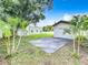 Large backyard with concrete pad and detached garage at 700 Eldridge St, Orlando, FL 32803