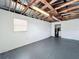 Spacious garage with high ceiling, overhead lighting, and extra storage at 700 Eldridge St, Orlando, FL 32803