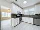Modern kitchen with stainless steel appliances and granite countertops at 700 Eldridge St, Orlando, FL 32803