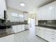 Updated kitchen with granite countertops and stainless steel appliances at 700 Eldridge St, Orlando, FL 32803