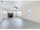 Bright living room with fireplace and tile floors at 700 Eldridge St, Orlando, FL 32803