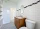 Bathroom with subway tile and wood vanity at 700 Eldridge St, Orlando, FL 32803
