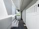 Side yard access to the backyard with steps and a fence at 700 Eldridge St, Orlando, FL 32803
