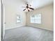 Bright bedroom with tile floors and ceiling fan at 700 Eldridge St, Orlando, FL 32803