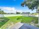 Large grassy backyard with detached garage and fence at 700 Eldridge St, Orlando, FL 32803