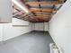 Bright garage with high ceilings, overhead lighting, and garage door at 700 Eldridge St, Orlando, FL 32803