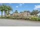 Stone entrance sign welcomes residents to the Tapestry community at 2599 Nouveau Way, Kissimmee, FL 34741