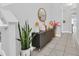 Bright entryway with console table and decor at 2599 Nouveau Way, Kissimmee, FL 34741
